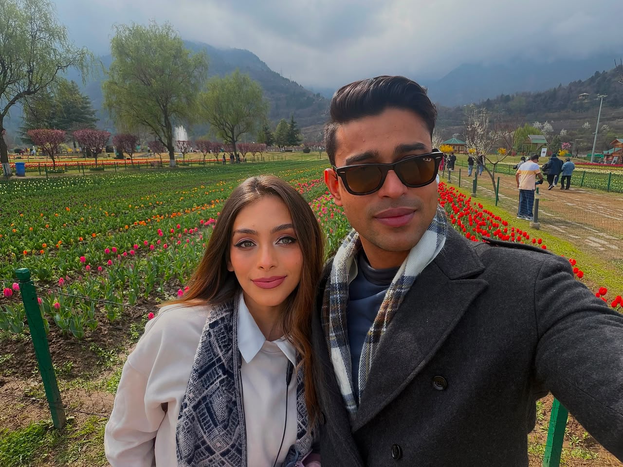 Sneha and Pratyush together in a flower garden